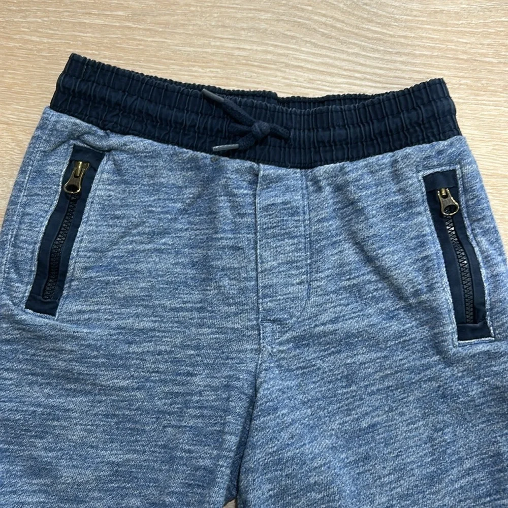 Baby Gap soft blue shorts with zipper pockets accented with dark blue! Size 4